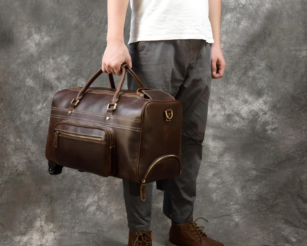 leather carry on bag wheels